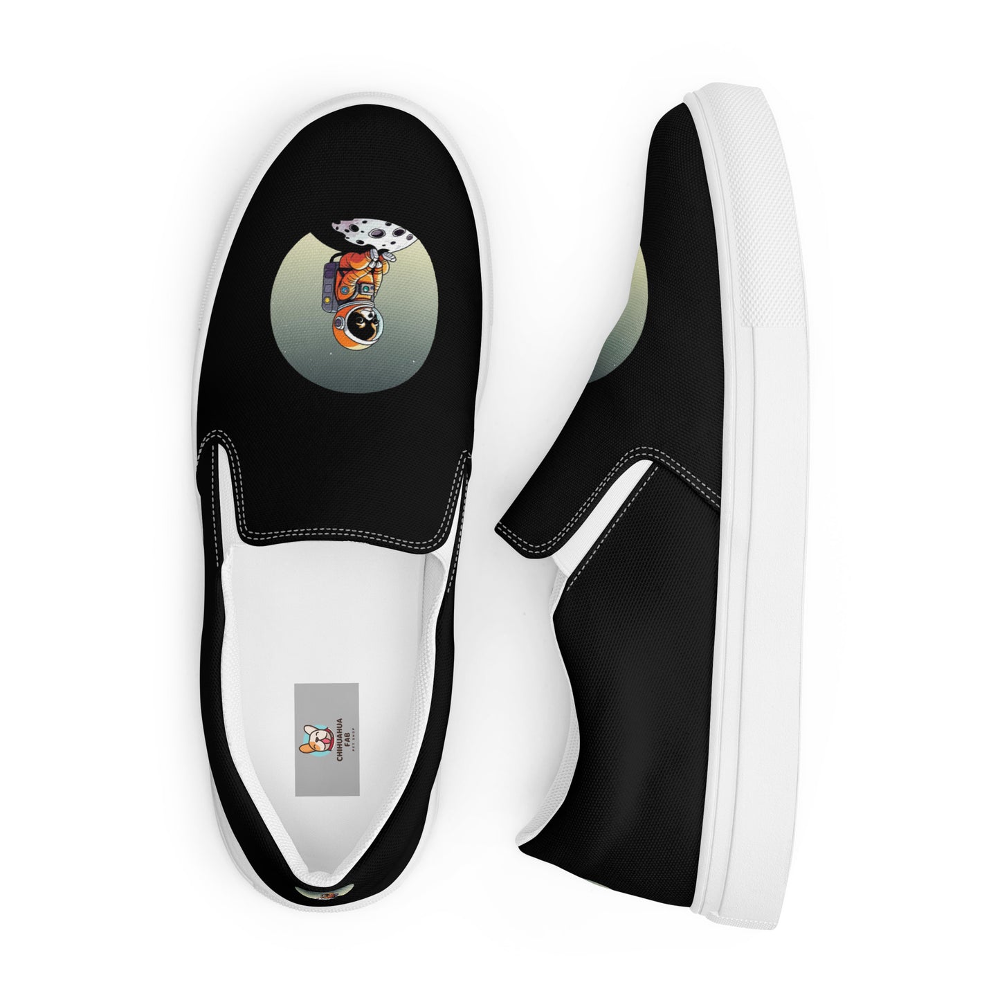 Product image from above of a black pair of women's slip on canvas shoes featuring a cute astronaut Chihuahua dog sitting on a small moon.